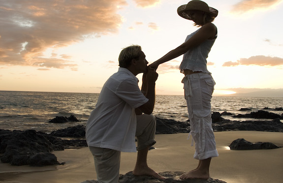 Man proposing on a beach