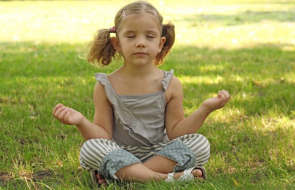 Little girl meditating, Six Senses Porto Elounda Golf & Spa Resort