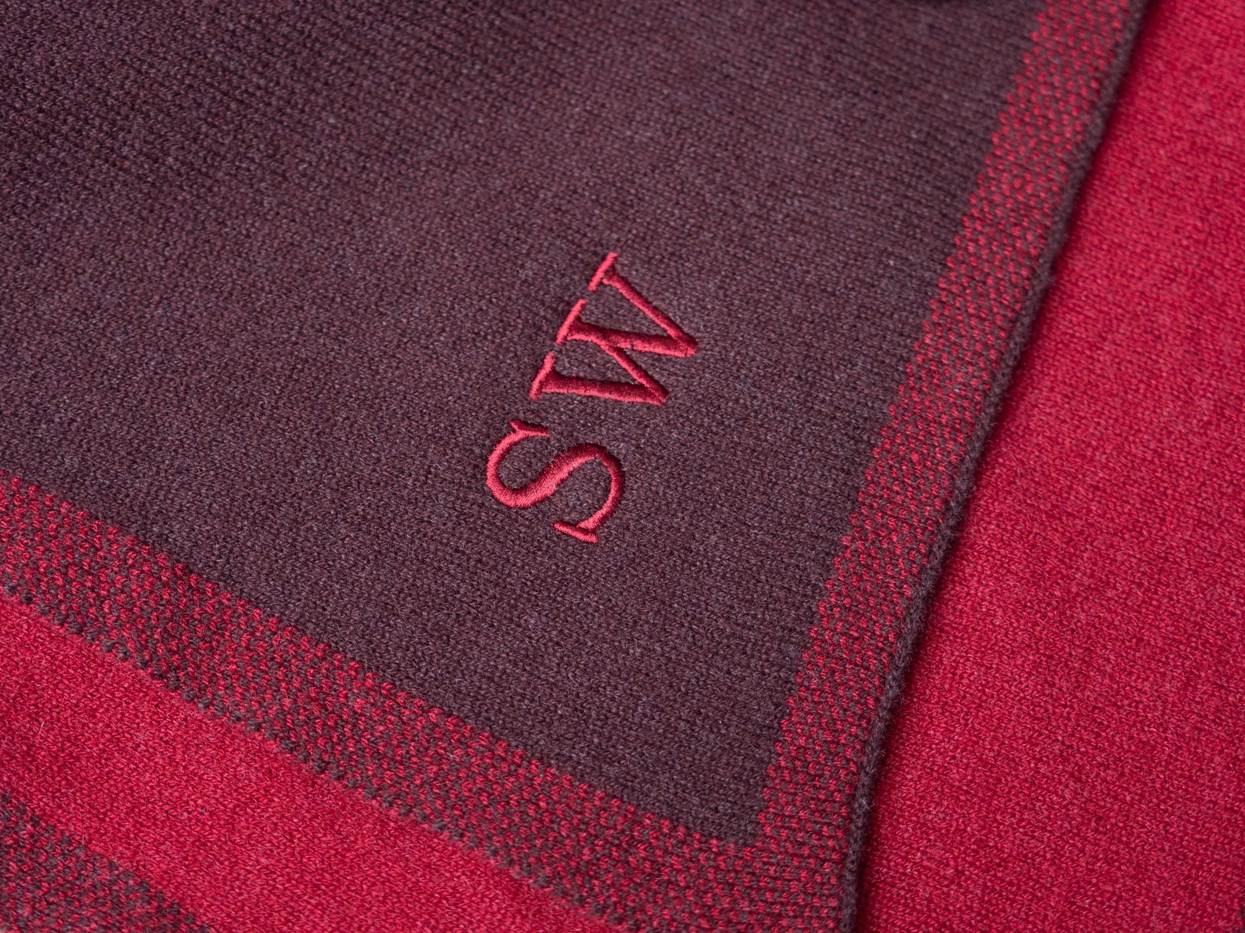 monogrammed letters on ruby red cashmere shawl wrap
